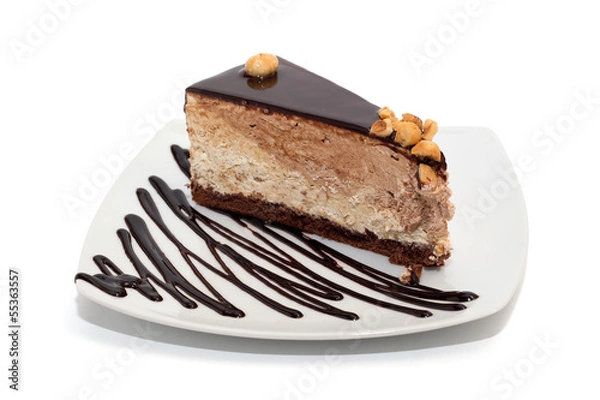 Obraz Nougat cake with chocolate, hazelnuts and topping isolated