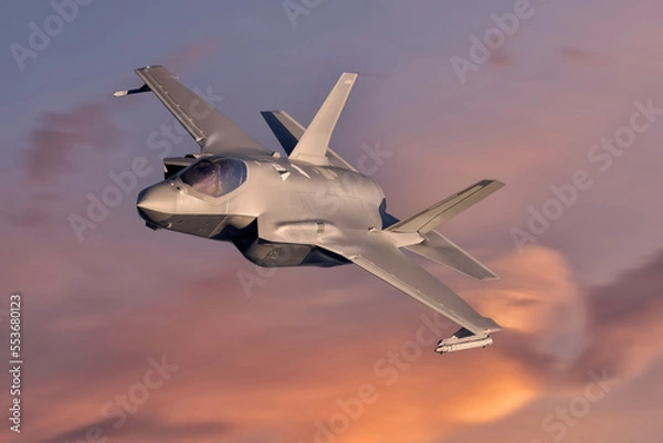Fototapeta F35 modern fifth generation Fighter jet flying over with missiles on way to combat mission. Modern fighter jets and Airforce pilots on deployment for air defence sunset sky dramatic NATO jet