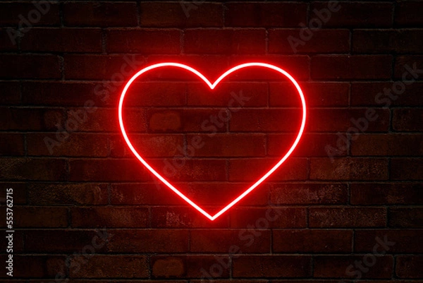 Fototapeta Neon heart with a glow on the background of a dark brick wall. Neon sign.