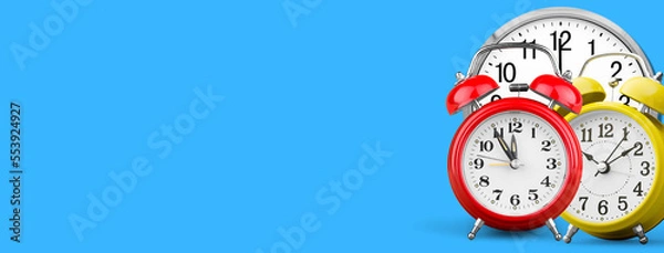 Fototapeta Alarm Clock and Time Management Concept with Blue Background and Copyspace Area, Time Planning Strategy. Suitable for Web Banner, Free Space Area