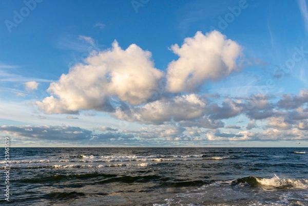 Fototapeta Clouds over the sea