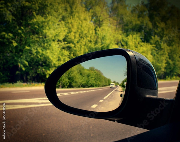 Fototapeta mirror of the car with the road