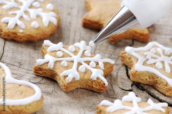 Obraz Christmas cinnamon cookies decorating process