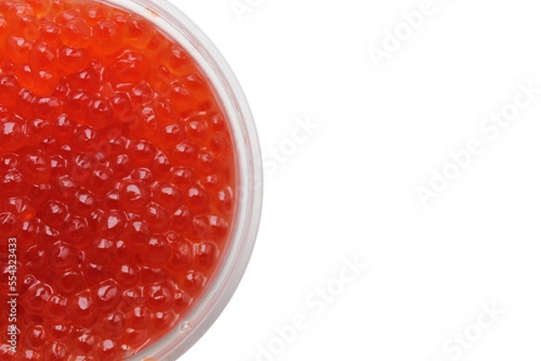 Fototapeta Red caviar close-up on a white background flat lay, delicacy, appetizer, salmon caviar, fish caviar, red caviar background wallpaper