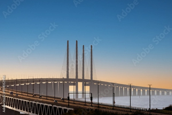 Obraz The Oresund Bridge is a combined motorway and railway bridge between Sweden and Denmark (Malmo and Copenhagen).