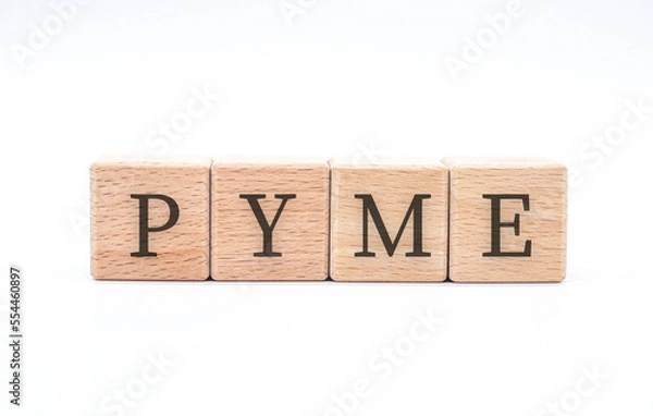 Obraz word " pyme " written in wooden blocks on white background
