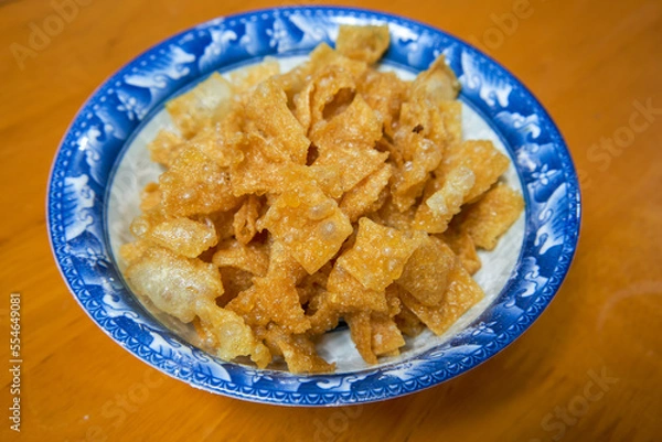 Fototapeta The perfect congee companion, fried noodle