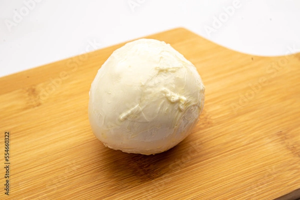 Obraz Mozzarella cheese on a board