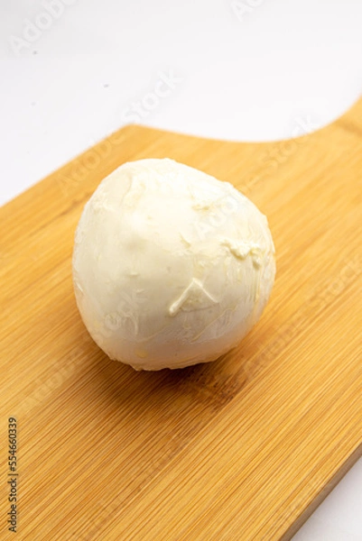 Obraz Mozzarella cheese on a board