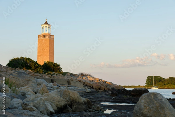 Fototapeta Avery Point Lighthouse in Groton Connecticut Atlantic Ocean at Low Tide