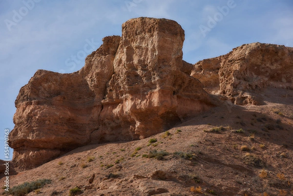 Fototapeta Sandy canyon with red rocks. Charyn.