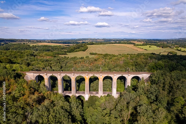 Fototapeta Viaduc Rocherolles in the Forest in summer, Haute vienne, France