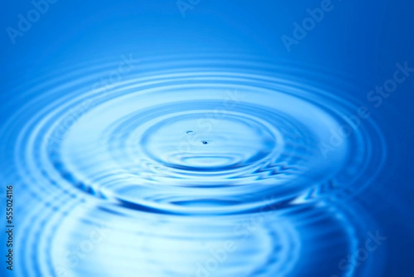 Fototapeta splash blue water drop with circular waves