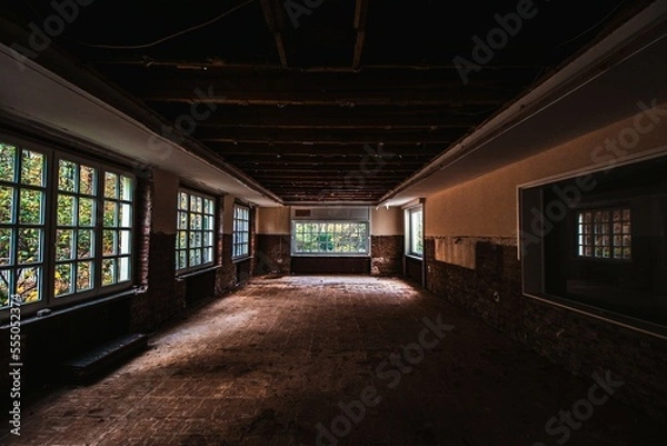 Fototapeta old abandoned building in light and shadow