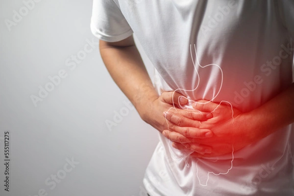 Obraz man having abdominal pain on white background