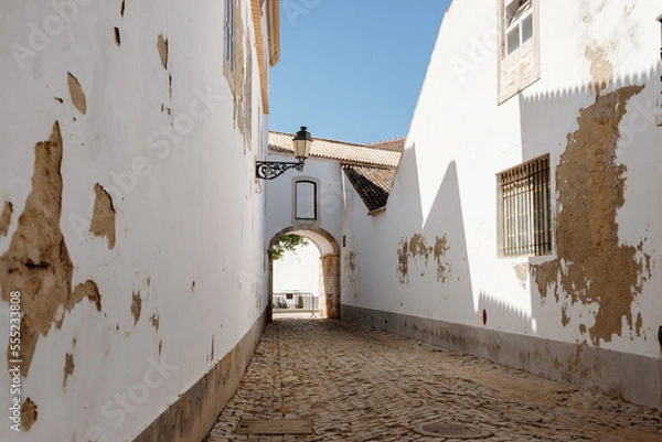 Obraz Walking through the old streets of the center of Faro, a town in the Algarve in Portugal.