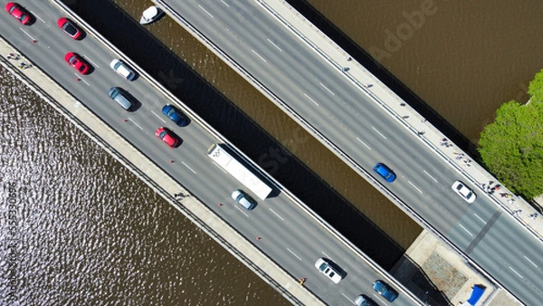 Fototapeta Aerial view of cars driving on the Commonwealth Bridge on Lake Burley Griffin in Canberra, Australia