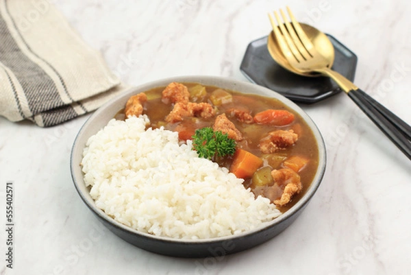 Fototapeta Japanese Curry with Crispy Chicken Popcorn, Potato, and Carrot