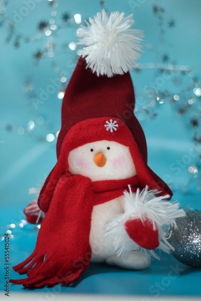 Obraz snowman on a blue background