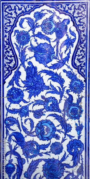 Fototapeta Blue tile panel of the mythical Phoenix bird and flowers motif in Topkapi Palace, Istanbul, Turkey.