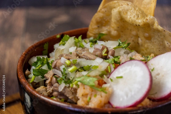 Fototapeta carne en su jugo mexican food, includes onion, radish, beef and corn tostadas