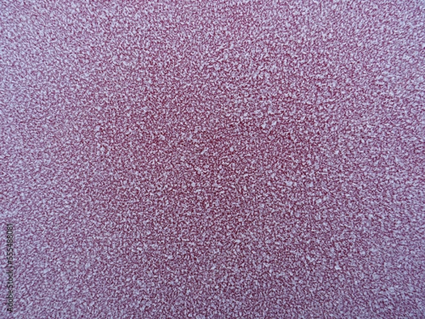 Obraz Textured white frost grains on red colour background.
