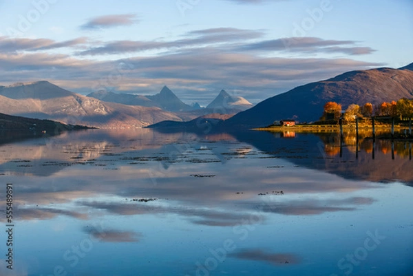 Obraz 
Fishermen`s hut at Arctic bay in Norway with reflection, Balsfjord, Lofoten, Norway