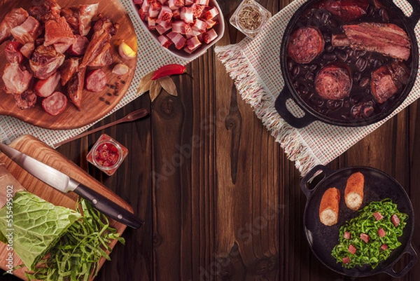 Fototapeta Ingredients for a typical brazilian meal feijoada - Top view