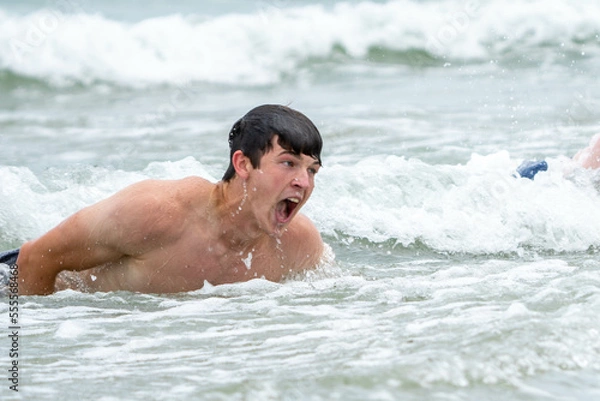 Obraz man swimming in the sea