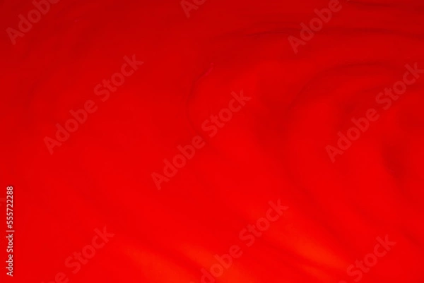 Fototapeta Red liquid, waves, fluidity.