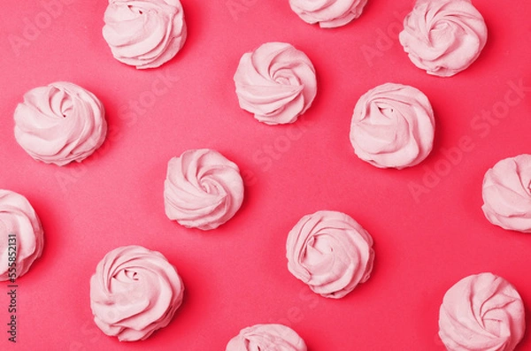 Obraz colorful marshmallows on magenta background. Color of year 2023. Viva magenta. Color sweet homemade zephyr