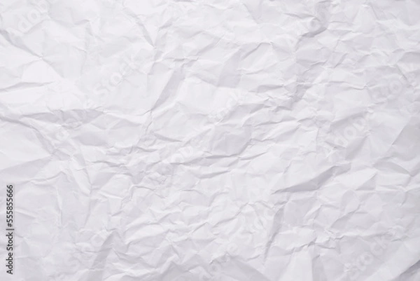 Fototapeta White crumpled paper texture background, clean white wrinkled paper, top view.