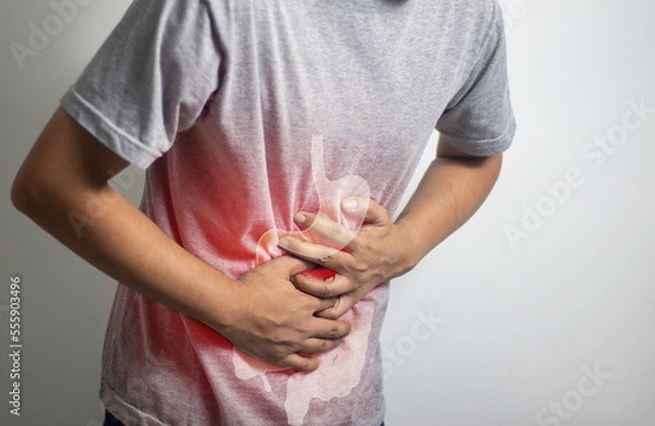 Obraz man having abdominal pain on white background