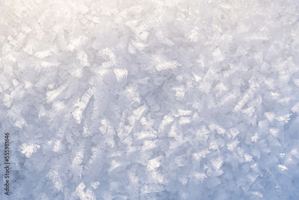Fototapeta A structure of ice crystals with a color gradient that can be used as a background