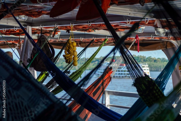 Fototapeta Hammocks hanged on the cruise on the Rio Amazons on the way to Belem from Manaus in Brazil