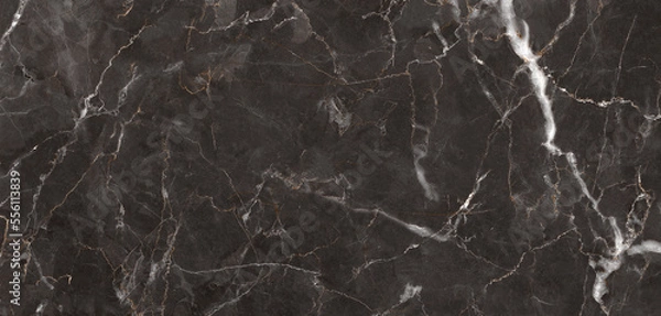 Fototapeta Black portoro marble stone background with white curly veins. Natural marble texture, hi-gloss premium texture of marble stone for digital slab tiles design, parking and kitchen interior decor.