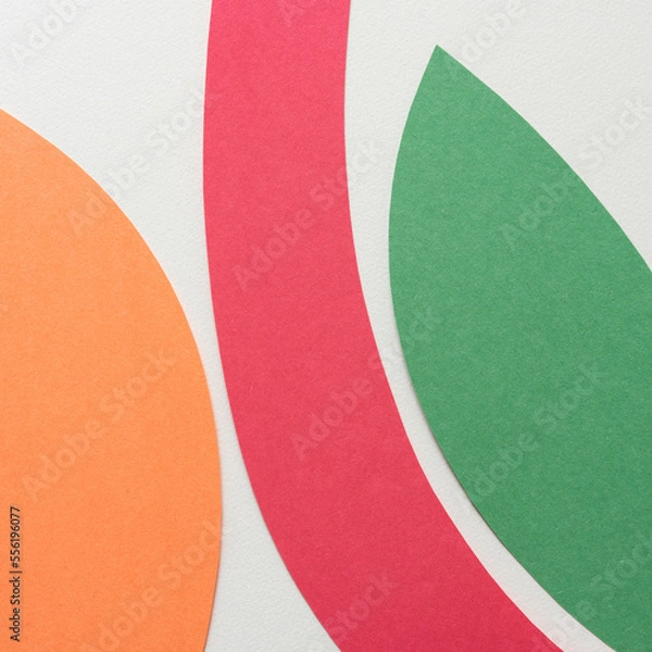 Obraz orange red and green paper shapes on blank paper