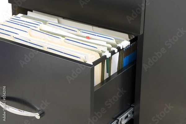 Fototapeta black cabinet  with opened drawer with files in folders