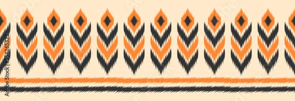 Obraz Border ethnic ikat pattern art. folk embroidery, and Mexican style. Aztec geometric ornament print. Design for background, illustration, fabric, clothing, textile, print, batik.