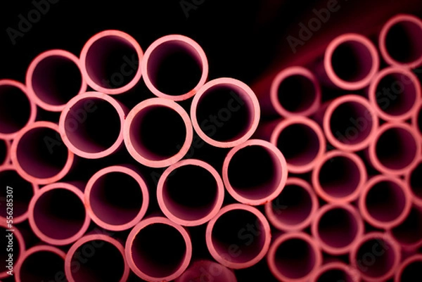 Fototapeta Background of the pink plastic pipes in stacked