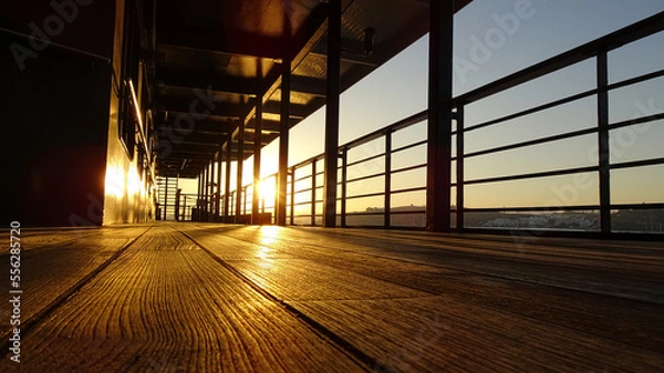 Obraz Abendsonnen an der Reling