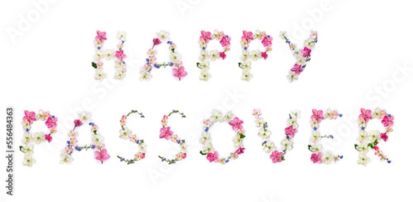 Fototapeta Happy Passover lettering text from of flowers apple tree and blue wildflowers forget-me-nots on white background. Top view, flat lay