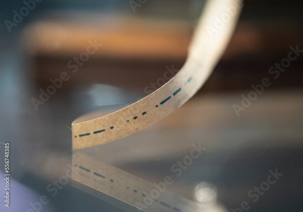 Fototapeta  paper ticker tape of telegraph machine