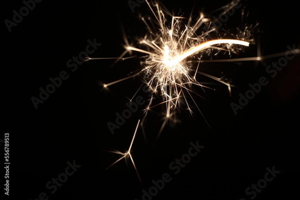 Fototapeta sparkler on black firework flame
