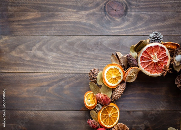 Fototapeta Christmas Circle handmade on wooden background
