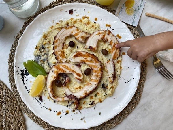 Fototapeta A plate with octopus seafood