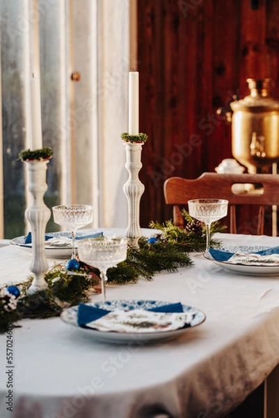Fototapeta Christmas table setting on the veranda