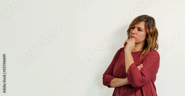 Obraz worried woman on a white background