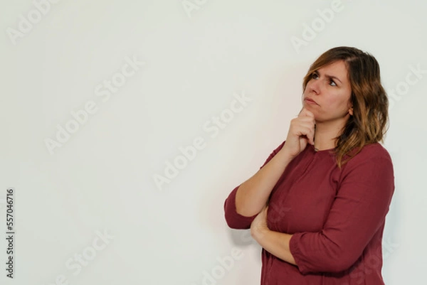Obraz pensive woman on a white background