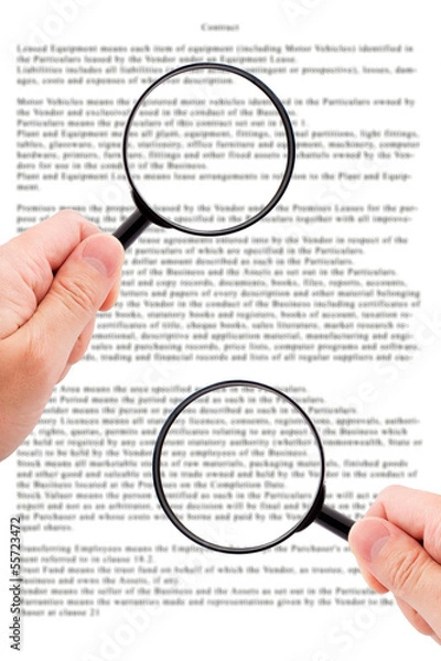 Obraz Hands holding magnifying glass reading document